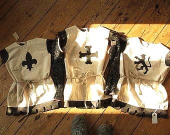 medieval tunic with variant insignia