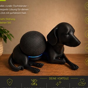Könnte beinhalten: Ein schwarzer Dackel-Ständer für einen Amazon Echo Dot Lautsprecher. Die Hundefigur liegt in einer liegenden Position, wobei der kugelförmige Lautsprecher auf dem Rücken montiert ist. Der Text auf dem Bild lautet 'TISCHSTÄNDER HUND/DACKEL FÜR ALEXA ECHO DOT'.