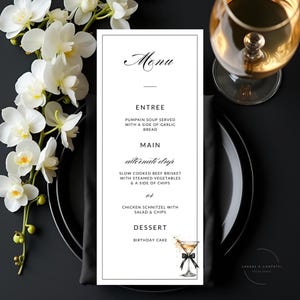 May include: A black and white menu card with the word "Menu" at the top, listing Entree, Main, and Dessert options. The menu includes pumpkin soup, beef brisket, and chicken schnitzel. A cocktail illustration is at the bottom. White orchids and a wine glass are in the background.