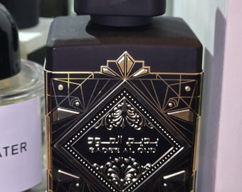 2 ml glass vial decanter of Bade'e Al Oud Oud for Glory Lattafa (unisex)