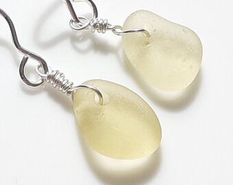 Seaham Sea Glass earrings of Pastel Yellow/Primrose drops suspended from Sterling Silver hooks - E3134 from Seaham,  UK