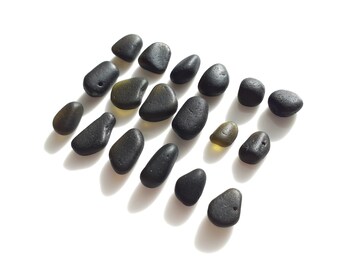 Collection of "Black" Sea Glass pebls, Three are Red/Purple and the remainder are "black" olive glass - E3251 - from Seaham, UK