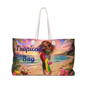 May include: Large tote bag with white rope handles. The bag features a colorful beach scene with the words "Tropical Bag" in blue. A woman in a Jamaican-themed outfit is on the beach. The bag is designed for carrying items.