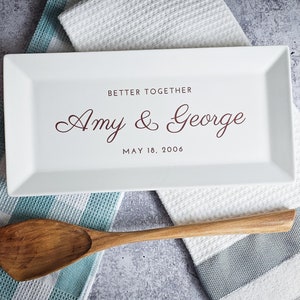 May include: White rectangular serving tray with the text "Better Together Amy & George May 18, 2006" in maroon lettering.