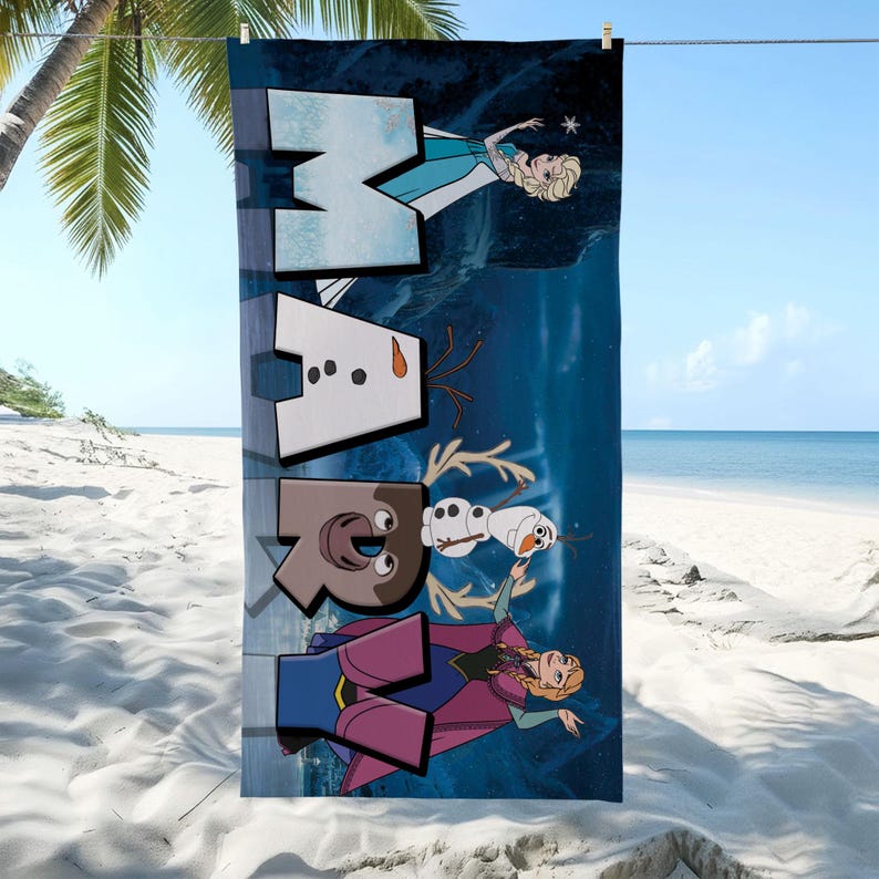 May include: A rectangular beach towel featuring a dark blue background with the word MARY spelled out in large, stylized letters. The letters incorporate characters from the movie Frozen, including Elsa, Olaf, Sven, and Anna, in a vertical design.