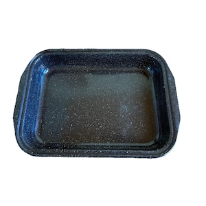 May include: A rectangular baking pan with a dark blue enamel finish featuring a white speckled pattern. The pan has rounded corners, a wide rim, and integrated side handles, providing a deep interior basin for cooking or roasting various food items.