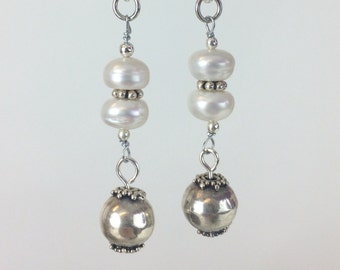 Button pearls and silver earrings