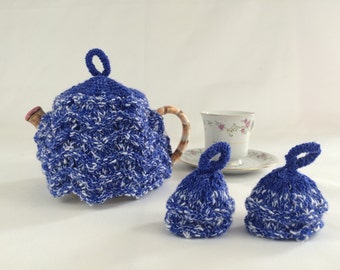 Blue tea cozy with two matching egg cosies