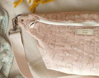 Light pink fanny pack in quilted Indian style fabric with removable ecru handle