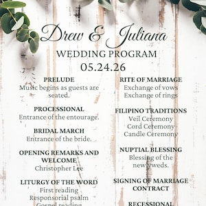 May include: A wedding program with the names "Drew & Juliana" and the date "05.24.26" printed in black on a white, rustic wooden background. The program details the ceremony's order, including prelude, processional, and readings.
