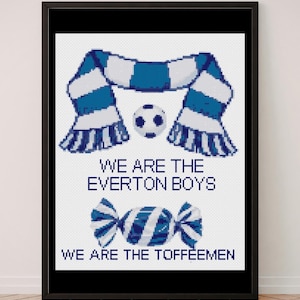 May include: A framed cross-stitch pattern featuring a blue and white striped scarf, a football, and a blue and white striped sweet. The text reads WE ARE THE EVERTON BOYS and WE ARE THE TOFFEEMEN in dark blue capital letters on a white background.