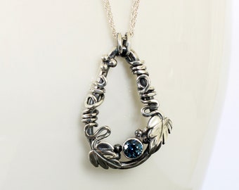 Colgante de zafiro de Montana hecho a mano: collar de hoja de plata esterlina, EE. UU. Zafiro tallado con precisión.