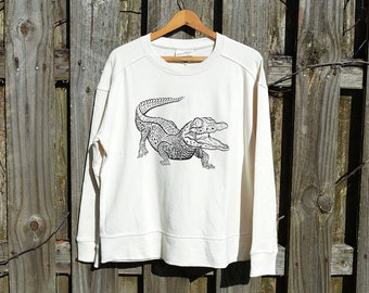 American Alligator Long Sleeve Terry Sweatshirt. Womens. Ivory White. Screen Printed. Crew Neck. Cotton Blend.