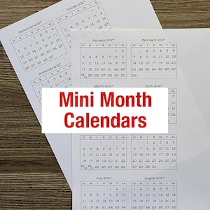 May include: A collection of printed white paper sheets featuring black ink mini month calendars for the year 2027, including September, October, November, January, February, March, April, July, and August, with the text Mini Month Calendars overlaid.