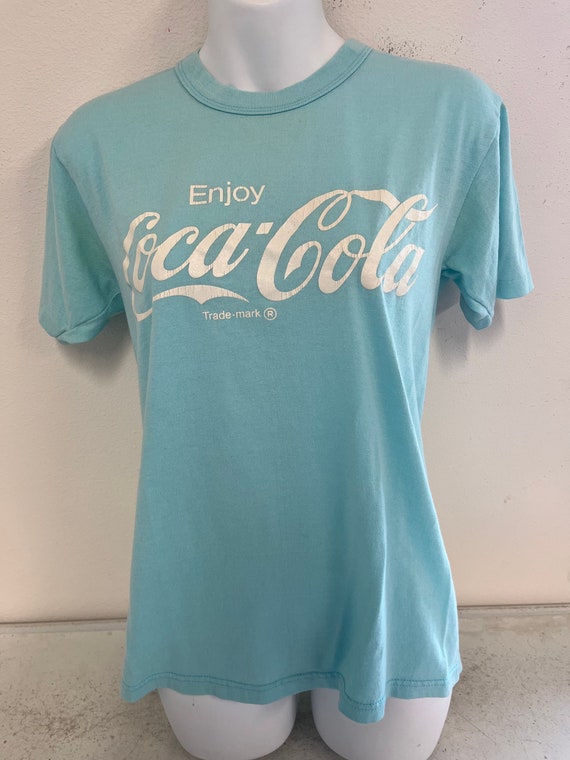 Vintage Coca Cola Light Blue Graphic Tee Size Medium Gem Vintage coca cola light blue graphic tee size medium gem