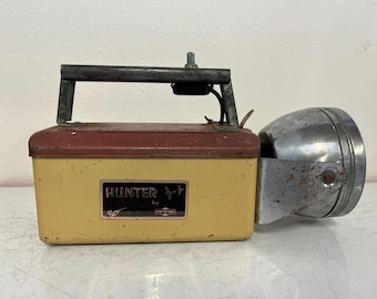 La lampe de poche Hunter vintage par Ray-O-Vac a besoin d'être réparée