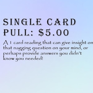 May include: A hand holding a tarot card with a sun illustration, surrounded by other tarot cards on a wooden surface. The image includes text that reads "SINGLE CARD PULL: $5.00" and "Tarot Readings."