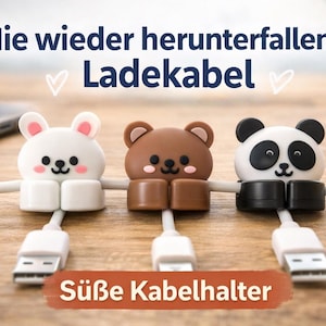 Könnte beinhalten: Drei Kabelhalter in Form eines weißen Hasen, eines braunen Bären und eines Pandabären. Jedes Tier ist an einem weißen USB-Kabel befestigt. Der Text "Nie wieder herunterfallende Ladekabel" und "Süße Kabelhalter" sind sichtbar.