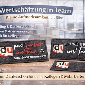 Könnte beinhalten: Drei dunkelgraue Filzhalter mit dem Text "du", sowie den Sätzen "passt perfekt ins Team" und "BIST WICHTIG im Team!". Das Bild enthält auch den Text "Mini Dankeschön für deine Kollegen & Mitarbeiter".