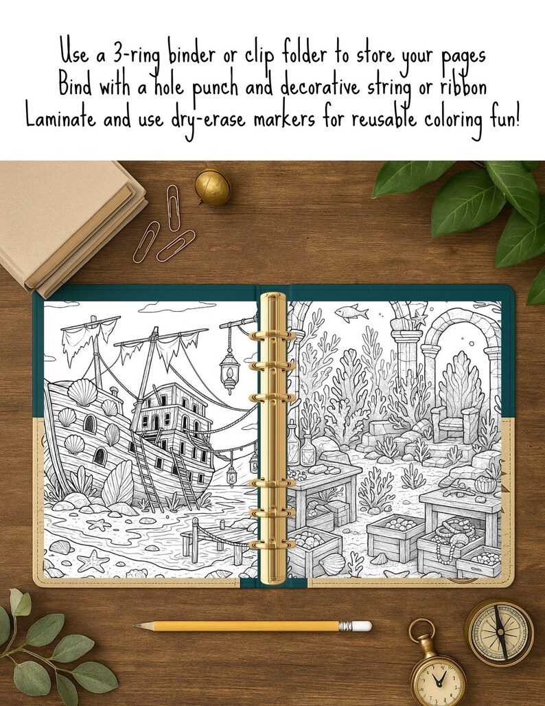 May include: Open, gold-ringed binder with a black and white coloring page featuring an underwater scene with a shipwreck. The binder is open on a wooden surface, with a pencil, paperclips, and a compass nearby. Text on the image encourages the use of dry-erase markers.