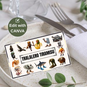 May include: A rectangular card with the text "TRALALERO TIRAMISU" and various cartoon characters, including a cat, shark, and monkey. The card is on a white plate with silverware and a napkin.