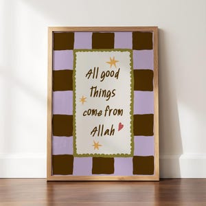 May include: A framed rectangular wall art print featuring a light purple and dark brown checkered background. The center contains a cream-colored rectangle with a scalloped olive green border, the text All good things come from Allah, three yellow stars, and a small red heart.