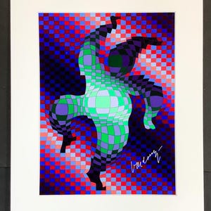 May include: Abstract art print featuring a geometric figure in shades of green, purple, and black, set against a checkered background of red, blue, and black. The artwork is framed in white and signed in the lower right corner.