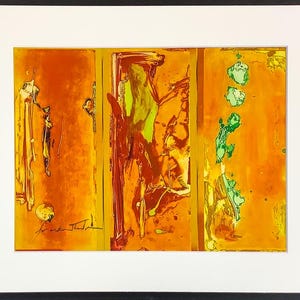 May include: Abstract artwork in a triptych format. The piece features a vibrant palette of orange, yellow, and green hues. The artwork is signed in the lower left corner. The piece is framed with a white mat and a black frame.