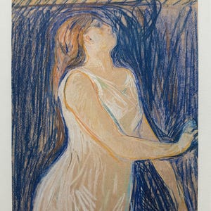 May include: A pastel drawing of a person in a white dress, looking upwards. The artwork features a color palette of beige, blue, and orange. The person's hair is orange, and the background is a mix of blue and beige. The artwork is signed and numbered.