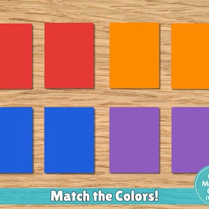 May include: A color matching game featuring pairs of red, orange, blue, and purple squares. The text "Match the Colors!" is displayed below the squares, with a circular graphic indicating "Color Matching Game (12 Pairs)."