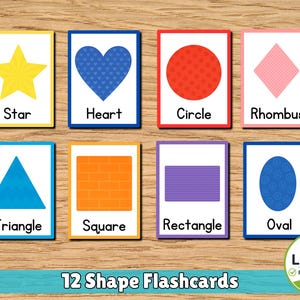 Könnte beinhalten: Acht Lernkarten mit geometrischen Formen, darunter ein gelber Stern, ein blaues Herz, ein roter Kreis, eine rosa Raute, ein blaues Dreieck, ein orangefarbenes Quadrat, ein lila Rechteck und ein blaues Oval, jeweils mit dem Namen beschriftet.