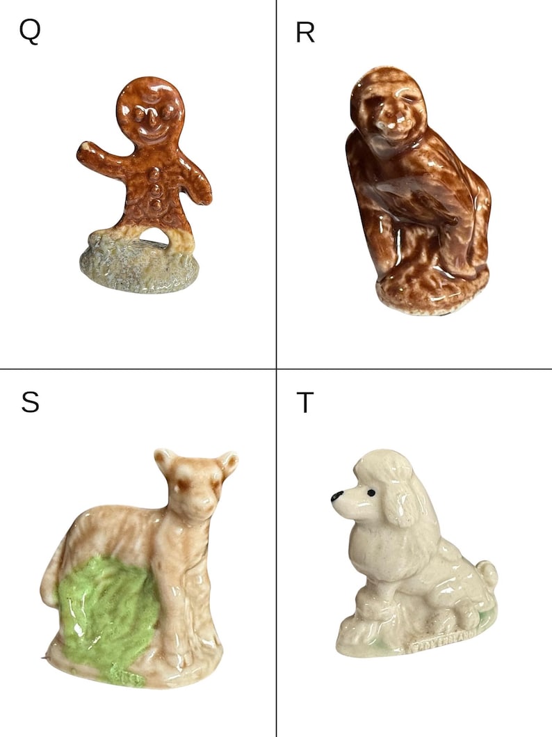 May include: Four small ceramic figurines: a gingerbread man, a monkey, a lamb, and a poodle. The gingerbread man is brown with a smiling face. The monkey is brown and seated. The lamb is tan with green accents. The poodle is white.
