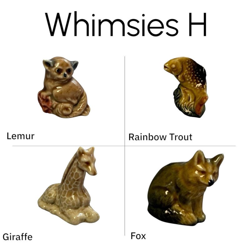 Seated lemur and rainbow trout miniatures on white background, muted greens and browns, vintage Wade Whimsies animal figurines