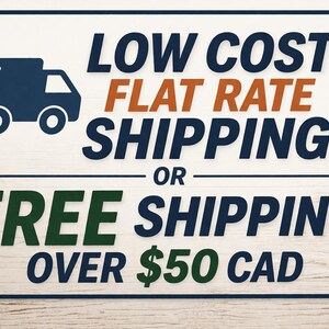 May include: A rectangular sign with a light wood grain background. The sign features a blue truck graphic and text that reads "LOW COST FLAT RATE SHIPPING" and "FREE SHIPPING OVER $50 CAD" in various colors.