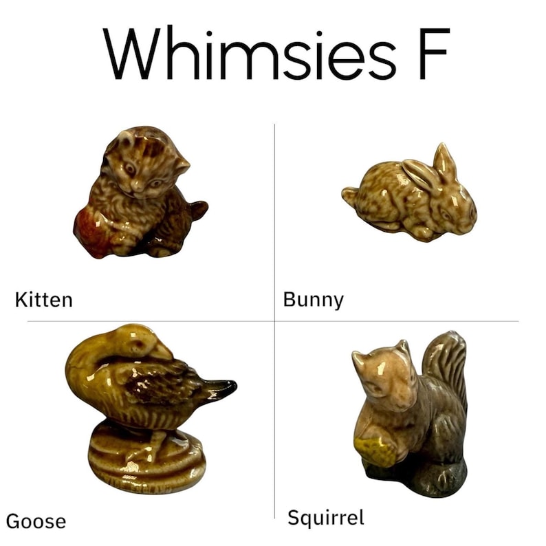 Close-up of glazed kitten, bunny and goose miniatures in warm brown tones, vintage Wade Whimsies animal figurines