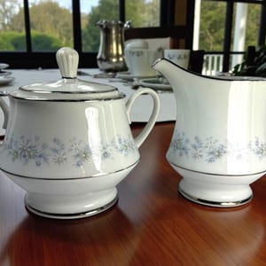 Noritake Marywood Sugar Bowl and Creamer Set: Blue Floral Platinum Trim