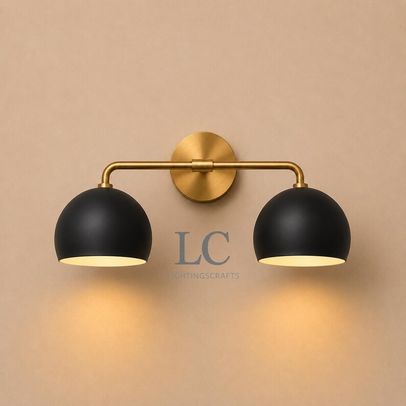 double wall sconce
brass vanity light
modern wall fixture
dual arm wall light
bathroom wall light
mid century light
vanity light brass
minimalist light
wall light fixture
home decor light
luxury wall light
vanity light
colorful sconce
vanity light, wall sconce, handcrafted light, modern vanity light, handmade lamp, brass wall sconce, dome shade light, triple vanity light, minimalist lighting, brass light, 3 light sconce, mid-century light, bathroom  fixture