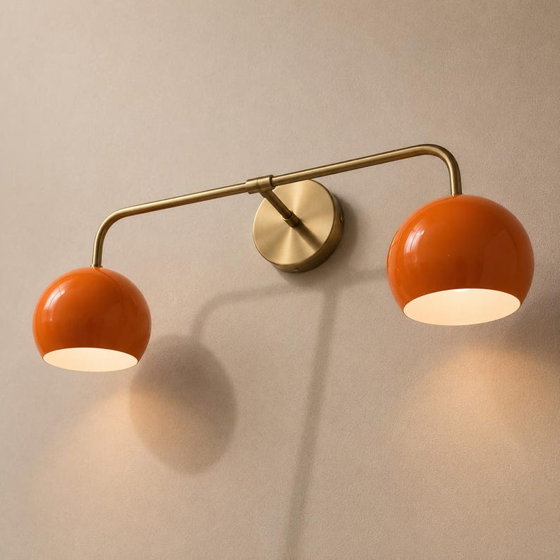 double wall sconce
brass vanity light
modern wall fixture
dual arm wall light
bathroom wall light
mid century light
vanity light brass
minimalist light
wall light fixture
home decor light
luxury wall light
orange Wall Light
Orange Sconce
vanity wall sconce, wall mounted sconce, flush mount sconce, bathroom Bedroom wall Sconce, Dome Shade Light, Double Arm Sconce, Reading Light, Wall Fixture Lamp, Italian wall Sconce, hallway Wall Sconce, Double Arm Fixture, Brass Wall Sconce, Modern Wall Lamp