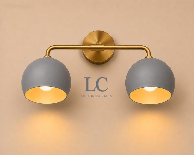 double wall sconce
brass vanity light
modern wall fixture
dual arm wall light
bathroom wall light
mid century light
vanity light brass
minimalist light
wall light fixture
home decor light
luxury wall light
vanity light
colorful sconce
vanity light, wall sconce, handcrafted light, modern vanity light, handmade lamp, brass wall sconce, dome shade light, triple vanity light, minimalist lighting, brass light, 3 light sconce, mid-century light, bathroom  fixture