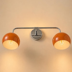 double wall sconce
brass vanity light
modern wall fixture
dual arm wall light
bathroom wall light
mid century light
vanity light brass
minimalist light
wall light fixture
home decor light
luxury wall light
orange Wall Light
Orange Sconce
vanity wall sconce, wall mounted sconce, flush mount sconce, bathroom Bedroom wall Sconce, Dome Shade Light, Double Arm Sconce, Reading Light, Wall Fixture Lamp, Italian wall Sconce, hallway Wall Sconce, Double Arm Fixture, Brass Wall Sconce, Modern Wall Lamp