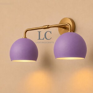double wall sconce
brass vanity light
modern wall fixture
dual arm wall light
bathroom wall light
mid century light
vanity light brass
minimalist light
wall light fixture
home decor light
luxury wall light
vanity light
colorful sconce
vanity light, wall sconce, handcrafted light, modern vanity light, handmade lamp, brass wall sconce, dome shade light, triple vanity light, minimalist lighting, brass light, 3 light sconce, mid-century light, bathroom  fixture