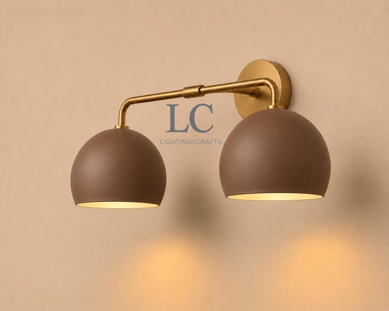 double wall sconce
brass vanity light
modern wall fixture
dual arm wall light
bathroom wall light
mid century light
vanity light brass
minimalist light
wall light fixture
home decor light
luxury wall light
vanity light
colorful sconce
vanity light, wall sconce, handcrafted light, modern vanity light, handmade lamp, brass wall sconce, dome shade light, triple vanity light, minimalist lighting, brass light, 3 light sconce, mid-century light, bathroom  fixture