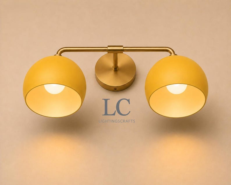 double wall sconce
brass vanity light
modern wall fixture
dual arm wall light
bathroom wall light
mid century light
vanity light brass
minimalist light
wall light fixture
home decor light
luxury wall light
vanity light
colorful sconce
vanity light, wall sconce, handcrafted light, modern vanity light, handmade lamp, brass wall sconce, dome shade light, triple vanity light, minimalist lighting, brass light, 3 light sconce, mid-century light, bathroom  fixture
