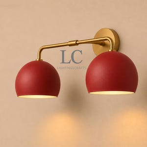 double wall sconce
brass vanity light
modern wall fixture
dual arm wall light
bathroom wall light
mid century light
vanity light brass
minimalist light
wall light fixture
home decor light
luxury wall light
vanity light
colorful sconce
vanity light, wall sconce, handcrafted light, modern vanity light, handmade lamp, brass wall sconce, dome shade light, triple vanity light, minimalist lighting, brass light, 3 light sconce, mid-century light, bathroom  fixture