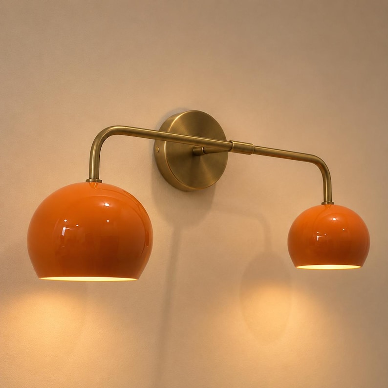 double wall sconce
brass vanity light
modern wall fixture
dual arm wall light
bathroom wall light
mid century light
vanity light brass
minimalist light
wall light fixture
home decor light
luxury wall light
orange Wall Light
Orange Sconce
vanity wall sconce, wall mounted sconce, flush mount sconce, bathroom Bedroom wall Sconce, Dome Shade Light, Double Arm Sconce, Reading Light, Wall Fixture Lamp, Italian wall Sconce, hallway Wall Sconce, Double Arm Fixture, Brass Wall Sconce, Modern Wall Lamp
