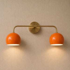 double wall sconce
brass vanity light
modern wall fixture
dual arm wall light
bathroom wall light
mid century light
vanity light brass
minimalist light
wall light fixture
home decor light
luxury wall light
orange Wall Light
Orange Sconce
vanity wall sconce, wall mounted sconce, flush mount sconce, bathroom Bedroom wall Sconce, Dome Shade Light, Double Arm Sconce, Reading Light, Wall Fixture Lamp, Italian wall Sconce, hallway Wall Sconce, Double Arm Fixture, Brass Wall Sconce, Modern Wall Lamp