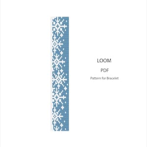 May include: A digital PDF pattern for a bracelet design. The pattern shows a vertical band of blue and white snowflake motifs. The text "LOOM PDF Pattern for Bracelet" is displayed on a white background.