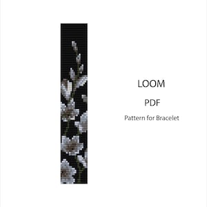May include: A black and white loom pattern for a bracelet featuring a floral design. The pattern shows white flowers with green stems against a black background. The text "LOOM PDF Pattern for Bracelet" is also visible.