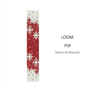 Op de afbeelding: Een digitaal weefpatroon voor een armband met een rood en wit gepixeld ontwerp van sneeuwvlokken. De afbeelding toont een verticale strook met een herhalend wintermotief. De tekst LOOM PDF Pattern for Bracelet staat aan de rechterkant.