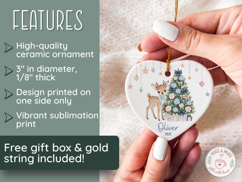 May include: Heart-shaped ceramic ornament featuring a deer and Christmas tree design. The ornament is 3 inches in diameter and 1/8 inch thick. The design is printed on one side with a vibrant sublimation print. The name "Oliver" and the year "2025" are printed on the ornament.